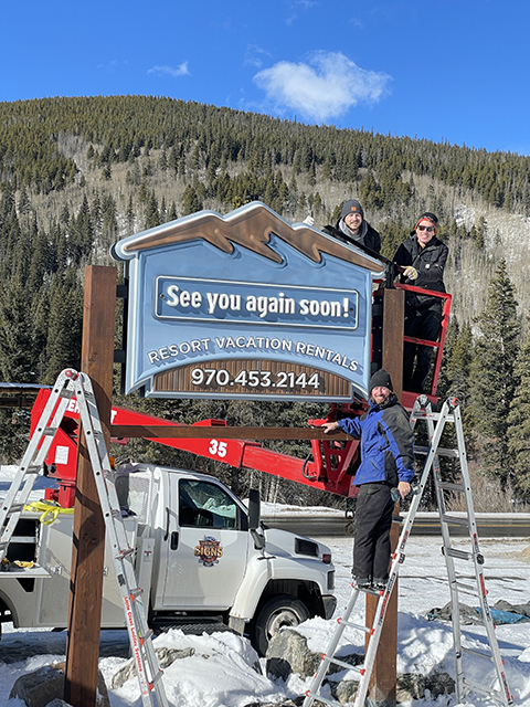 Blue Resort Sign